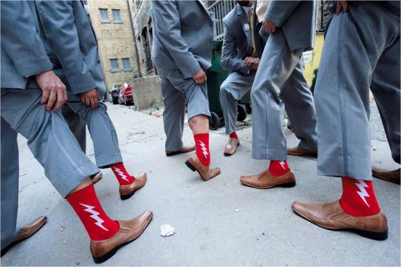 groomsmen-wear-grey-suits-brown-shoes-red-sock it to me -socks